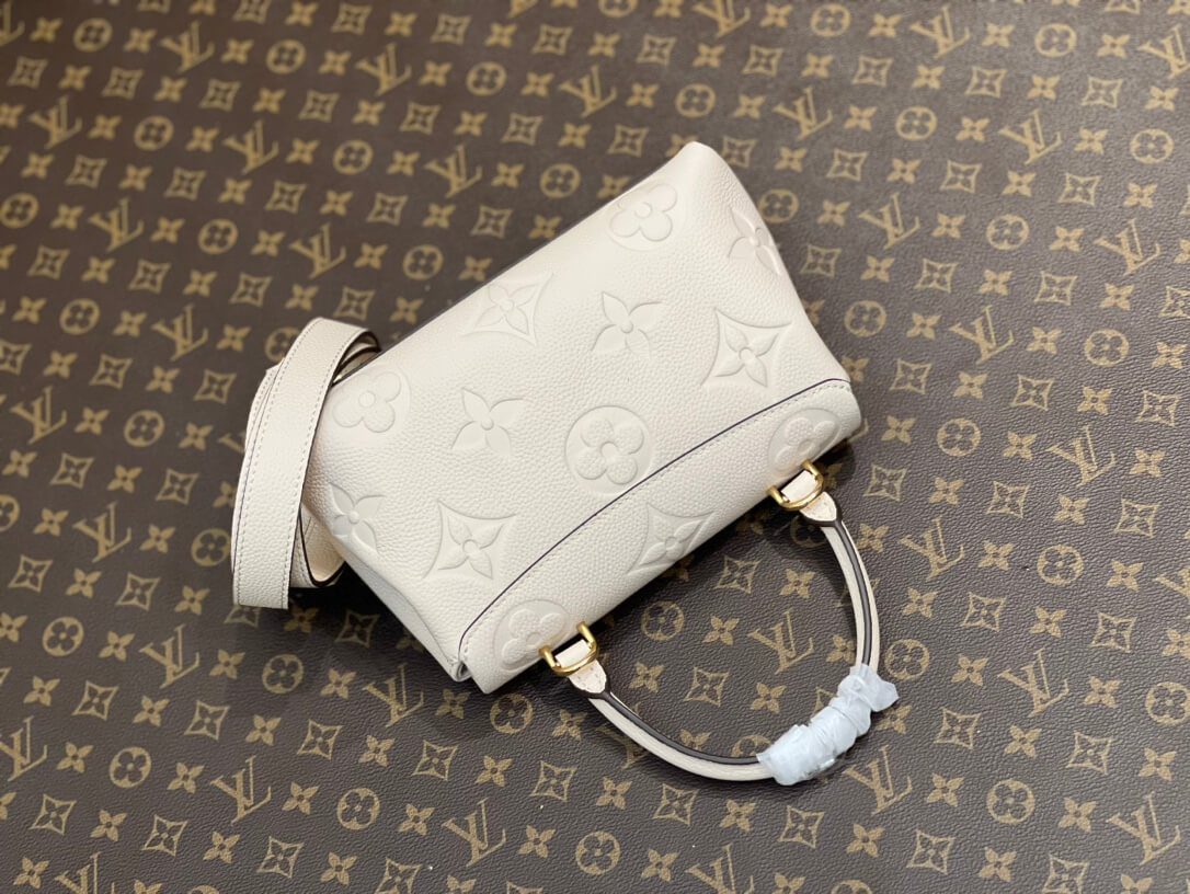 LOUIS VUITTON Madeleine BB Bicolore Empreinte - Image 8