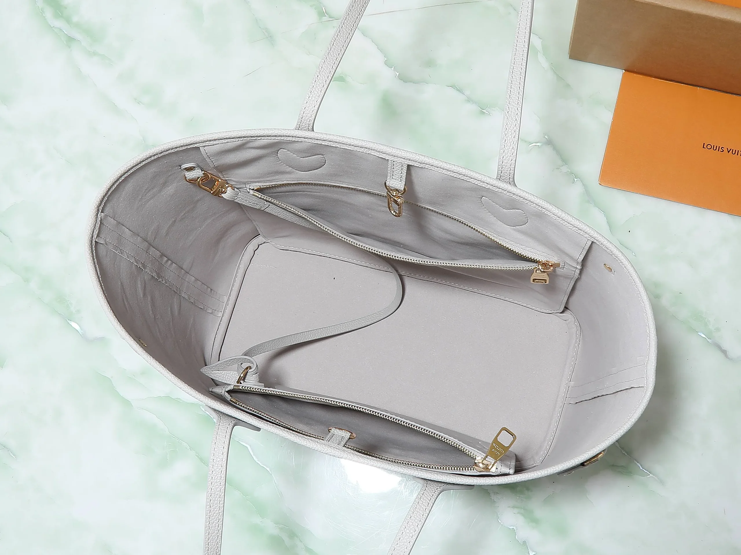 Neverfull MM Monogram Empreinte Leather - Image 10