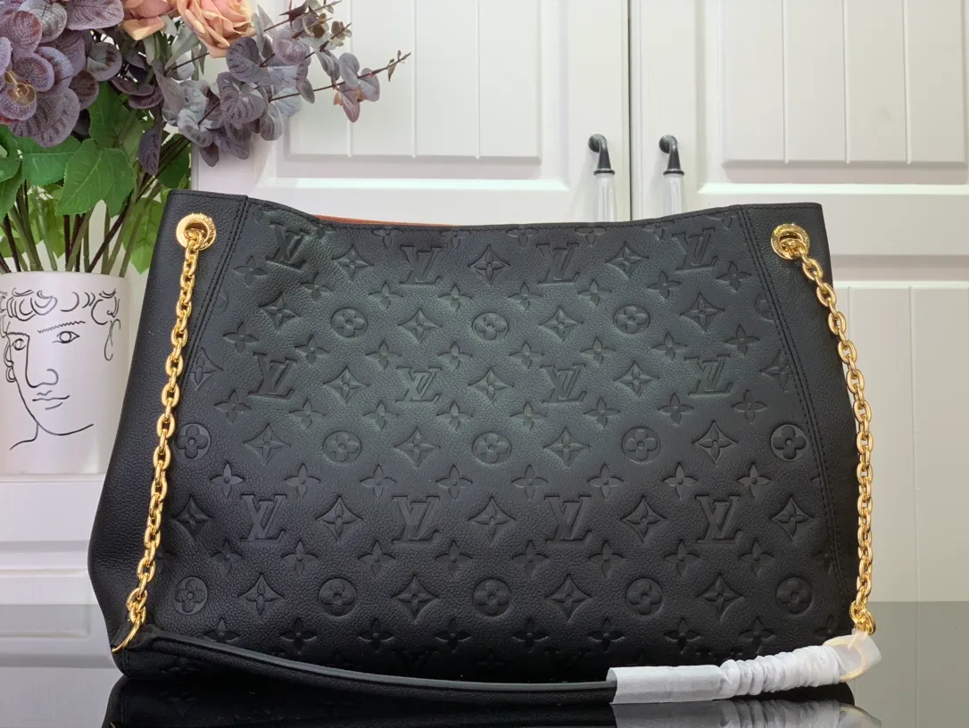 PM Monogram Empreinte Leather - Image 8