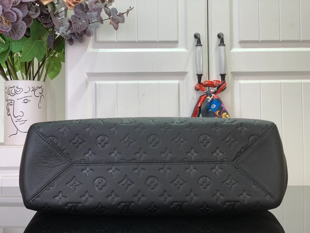 PM Monogram Empreinte Leather - Image 9