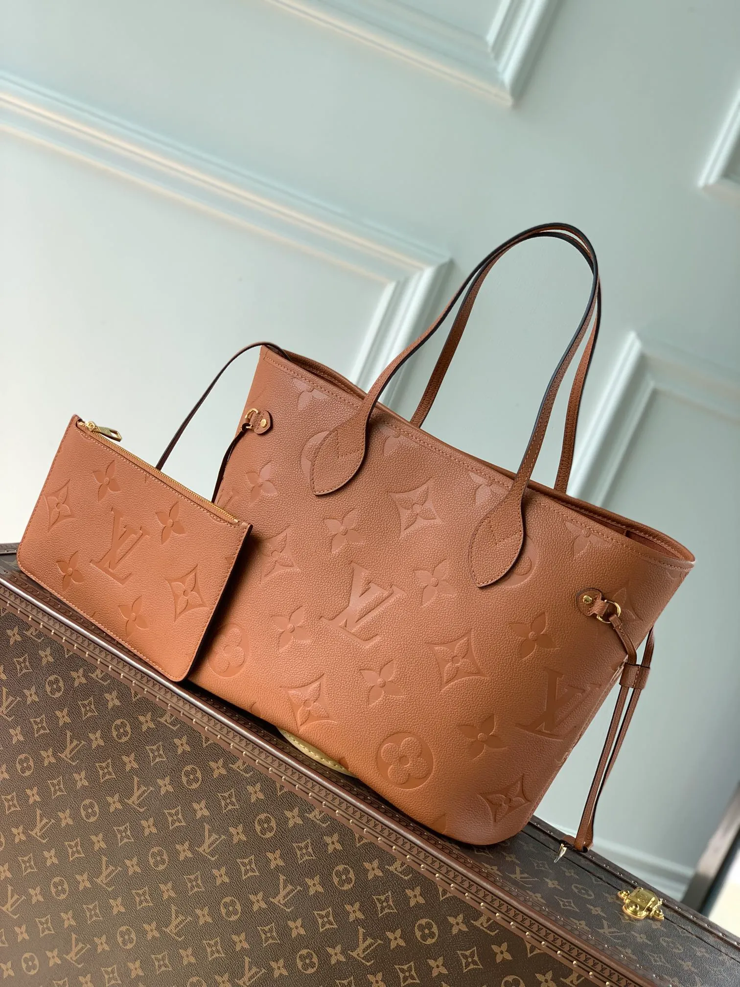 Neverfull MM Monogram Empreinte Leather Handbags