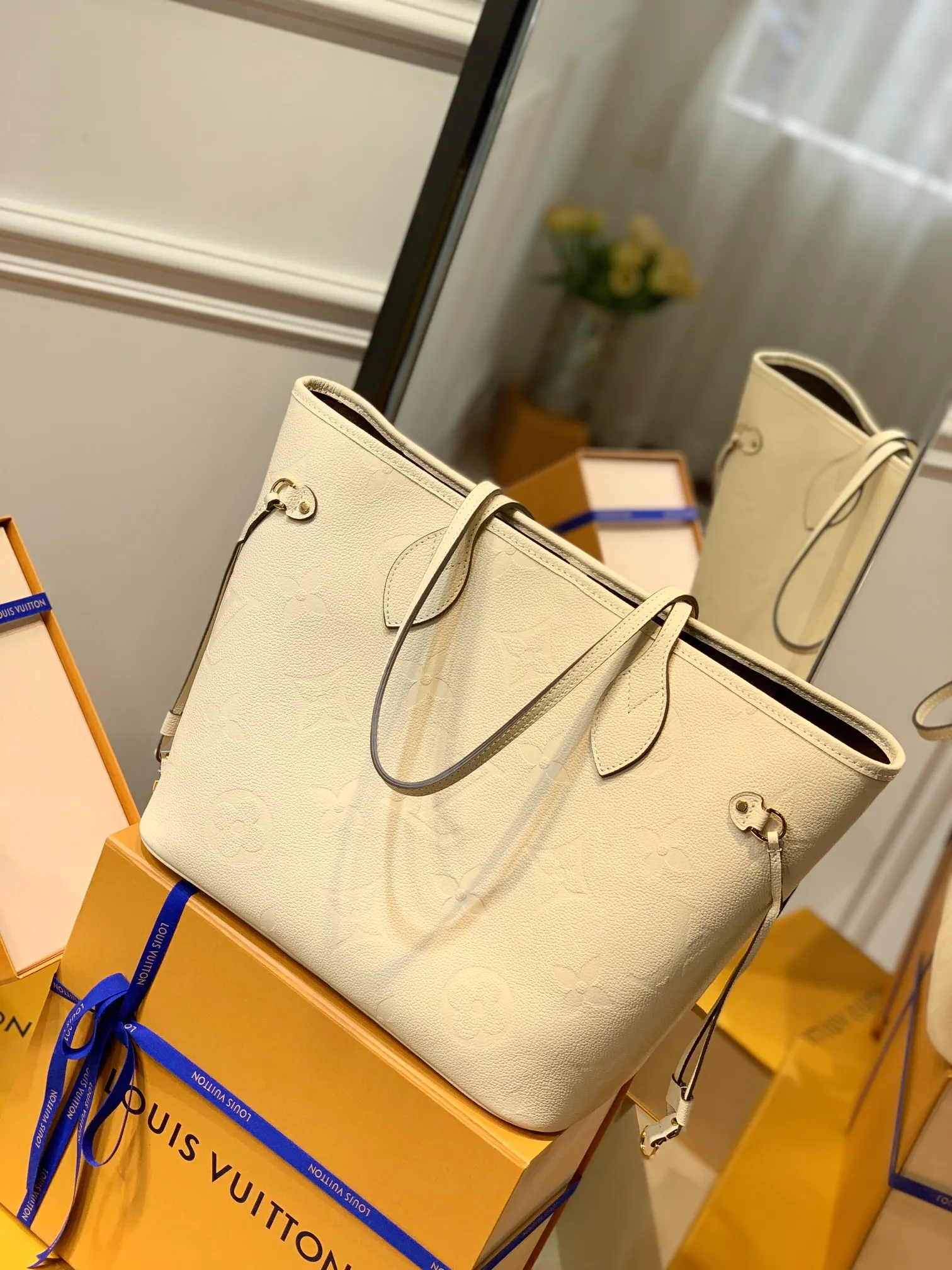 Neverfull MM Monogram Empreinte Leather Handbags - Image 4