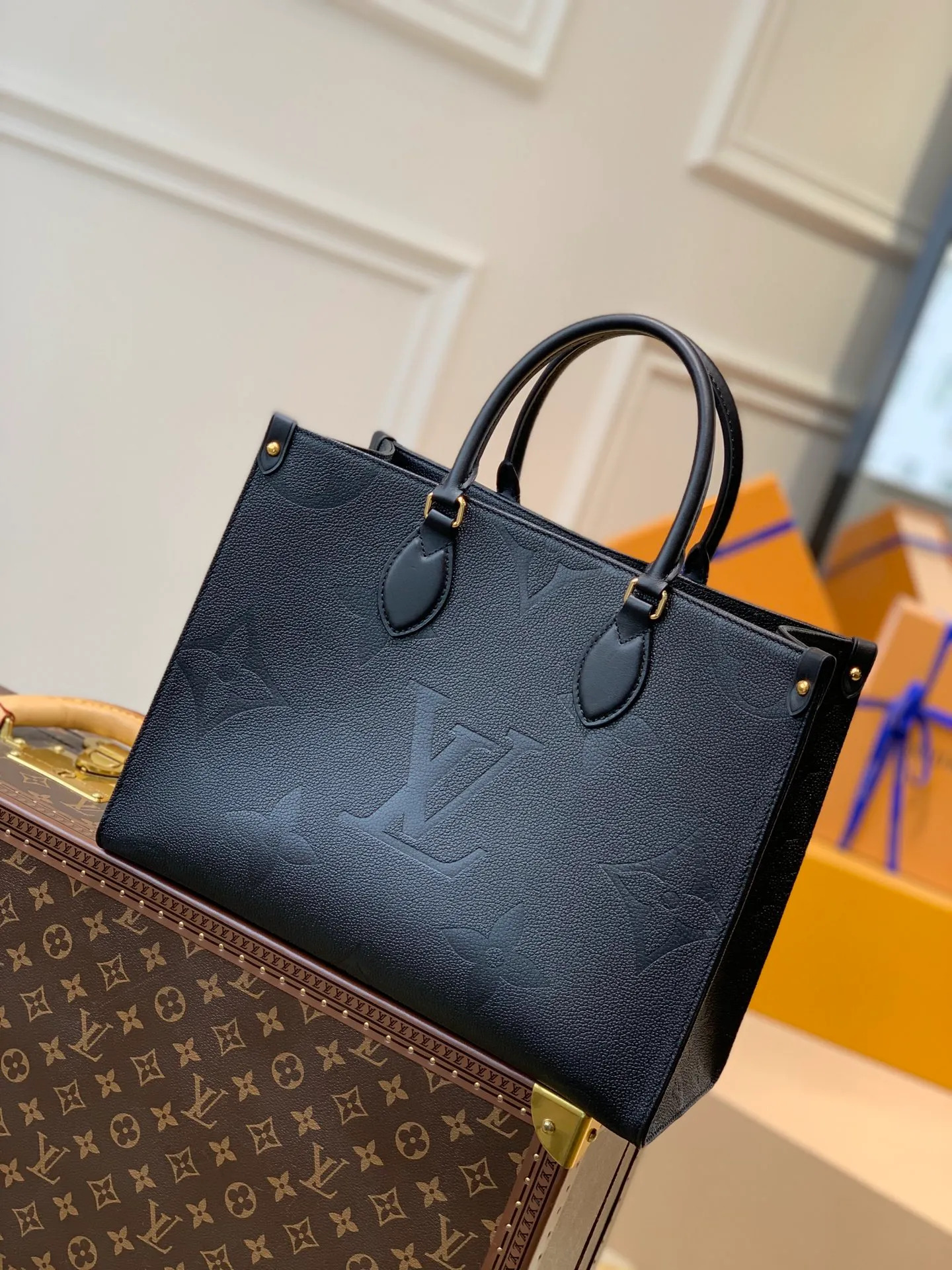 OnTheGo MM Monogram Empreinte Leather Handbags