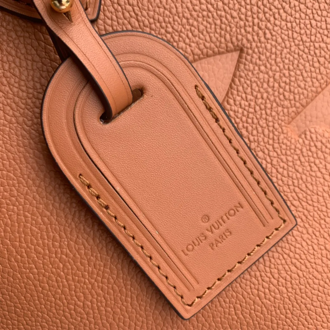OnTheGo MM Monogram Empreinte Leather Handbags - Image 6