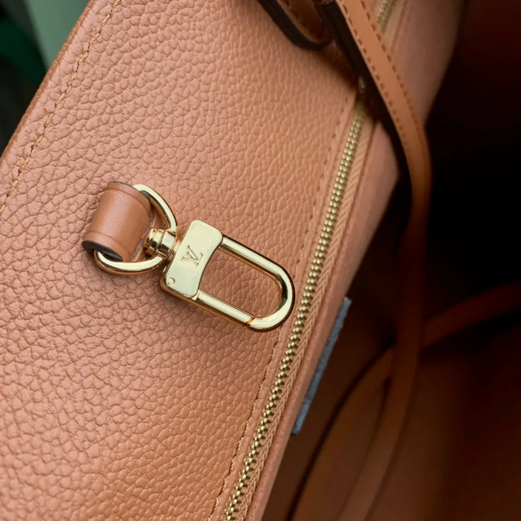 OnTheGo MM Monogram Empreinte Leather Handbags - Image 9