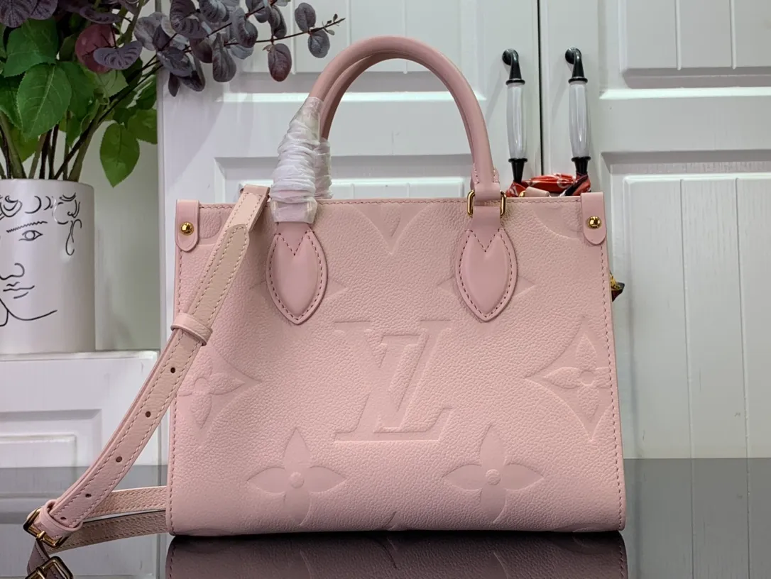 OnTheGo PM Monogram Empreinte Handbag