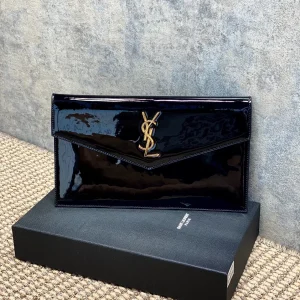 Saint Laurent Uptown Pouch In Patent Leather