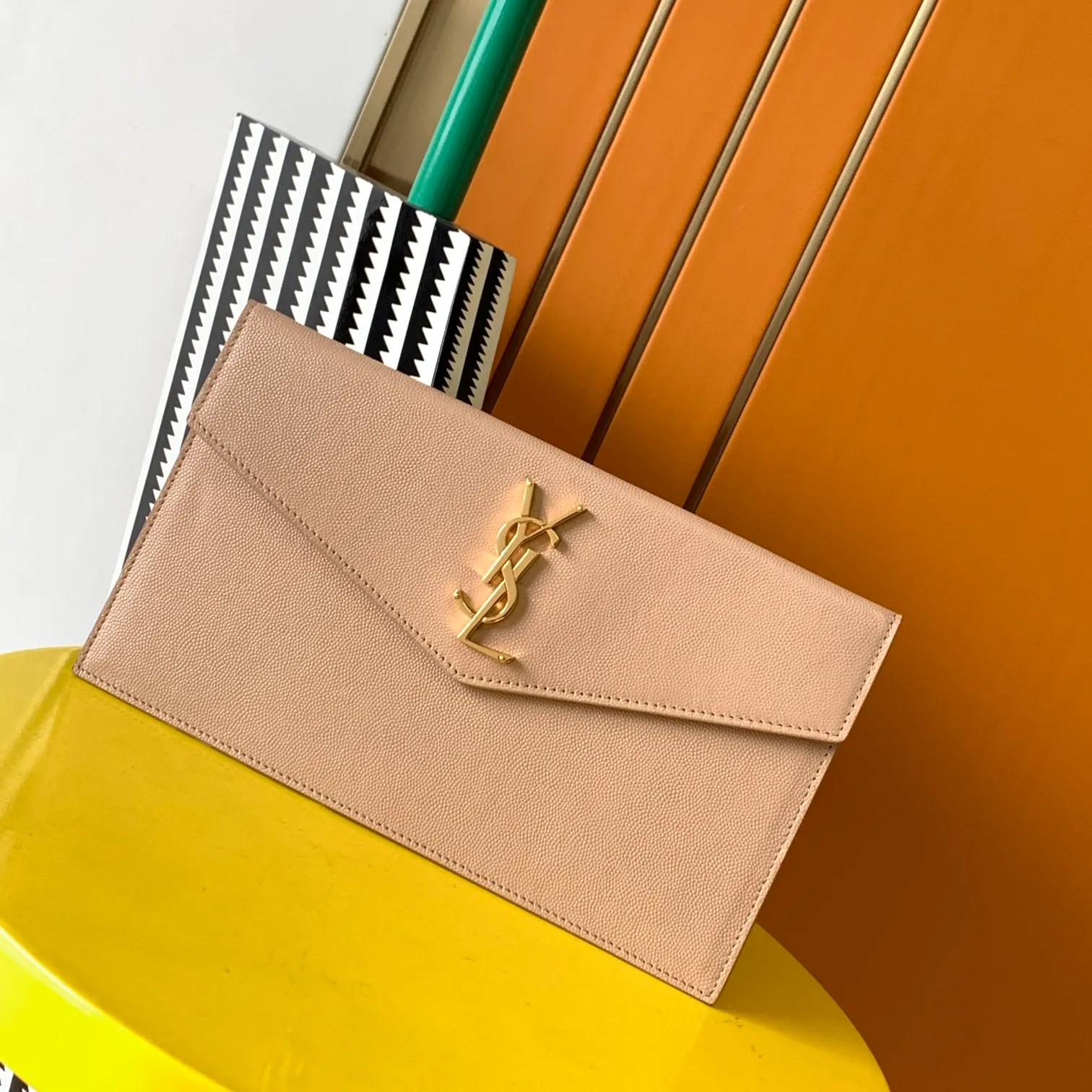 Uptown leather clutch in beige